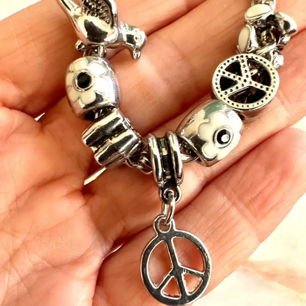 Silver tone bird flower peace owl charm bracelet